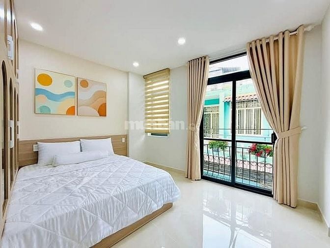 Nhà 4,5 x 9 nở hậu 5m đúc 1 trệt 2 lầu huỳnh khương an p5 gò vấp 