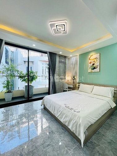 Bán nhà 4,5 tầng hẻm 7 chỗ đậu trong nhà full nội thất P14 GV 