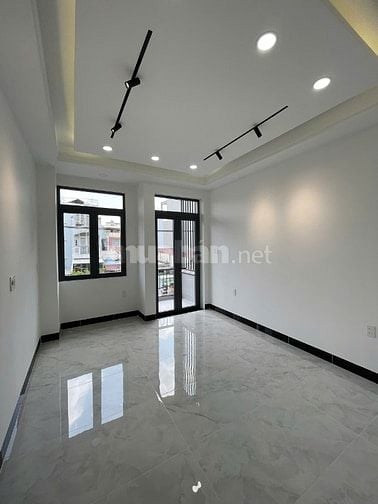 Bán nhà  MT 4 tầng số 235 đường Lê Quang Định đoạn giữa Nơ Trang Long 