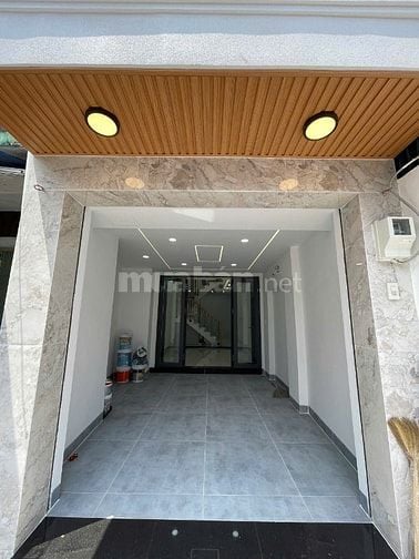Bán nhà  MT 4 tầng số 235 đường Lê Quang Định đoạn giữa Nơ Trang Long 