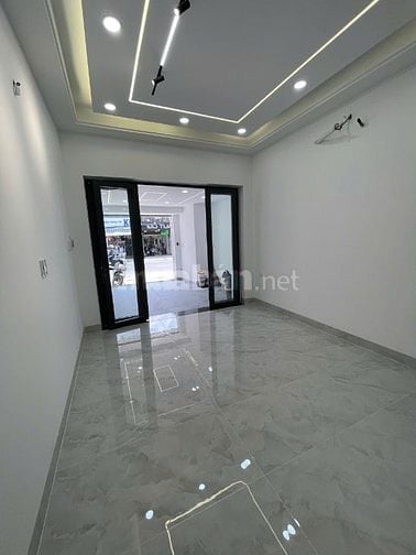 Bán nhà  MT 4 tầng số 235 đường Lê Quang Định đoạn giữa Nơ Trang Long 
