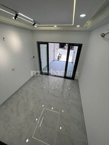 Bán nhà  MT 4 tầng số 235 đường Lê Quang Định đoạn giữa Nơ Trang Long 