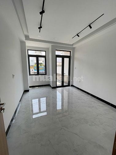Bán nhà  MT 4 tầng số 235 đường Lê Quang Định đoạn giữa Nơ Trang Long 