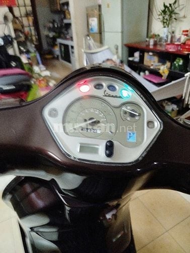 Bán xe Piaggio Vespa LX 125 màu nâu, đời 2012 tại Quận 4