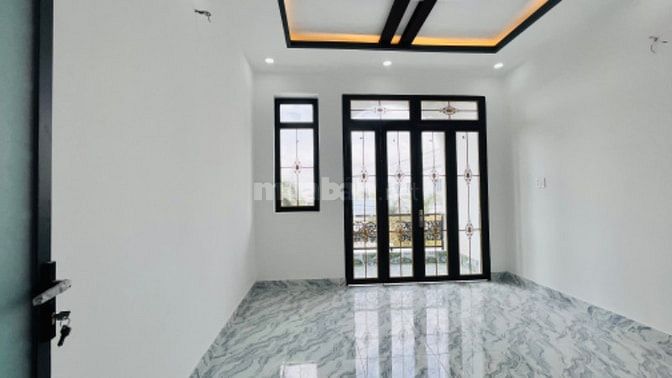Cần bán căn nhà 1 trệt 1 lầu kiên cố, vị trí đẹp ngay ngã 3 Tân Kim