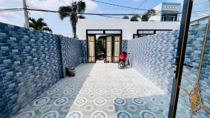 Cần bán căn nhà 1 trệt 1 lầu kiên cố, vị trí đẹp ngay ngã 3 Tân Kim