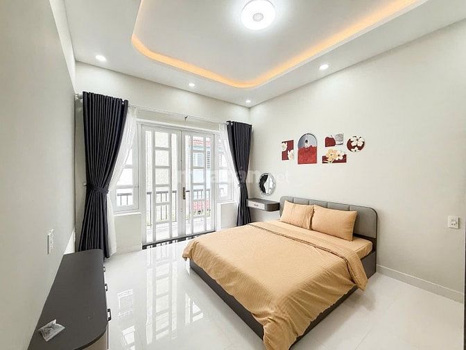 Nhà mới 3 tầng hẻm xe hơi 10m ra mặt tiền Hoàng Hoa Thám DT 3.75x12m