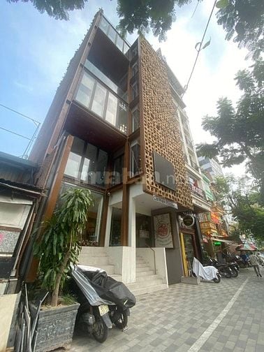 Siêu phẩm tòa nhà 9T mặt phố Lạc Long Quân DT120m2 MT9m gia 77ty