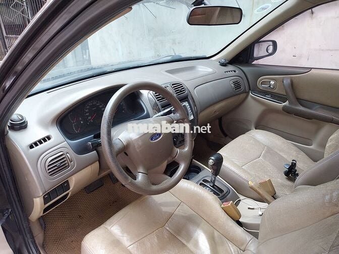 Dư dùng, cần bán Ford Laser 2004 GHIA 1.8 AT