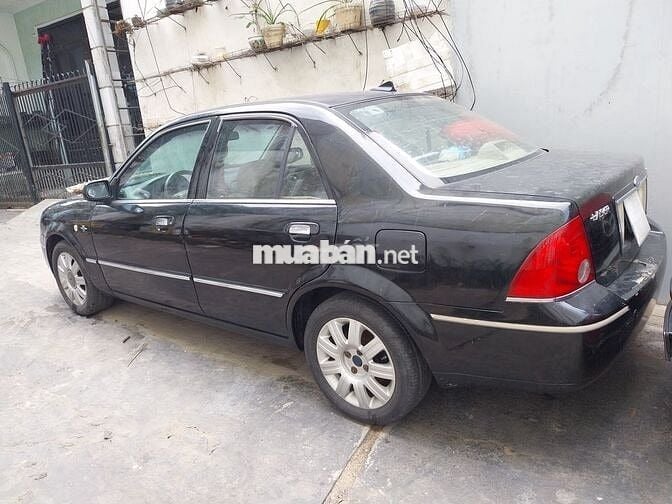 Ít dùng, cần bán Ford Laser 2004 GHIA 1.8 AT