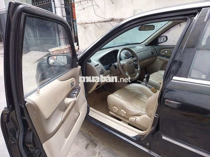 Ít dùng, cần bán Ford Laser 2004 GHIA 1.8 AT