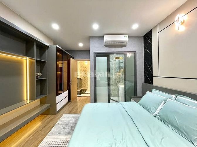 Nhà 4 x 11 đúc 1 lững 4 lầu có thang máy quang trung p11 gò vấp 