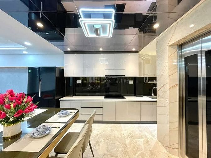 Nhà 4 x 11 đúc 1 lững 4 lầu có thang máy quang trung p11 gò vấp 