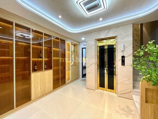 Nhà 4 x 11 đúc 1 lững 4 lầu có thang máy quang trung p11 gò vấp 