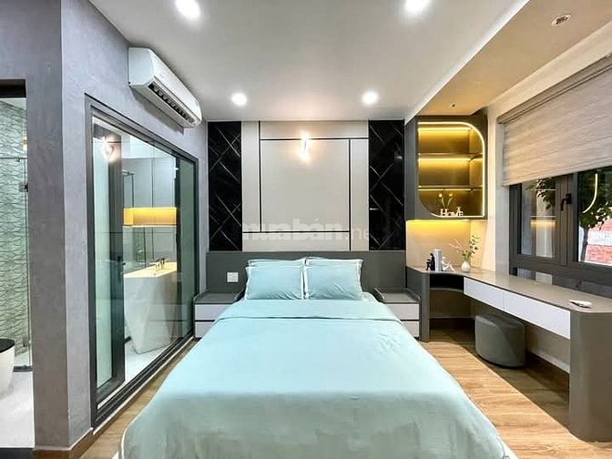 Nhà 4 x 11 đúc 1 lững 4 lầu có thang máy quang trung p11 gò vấp 