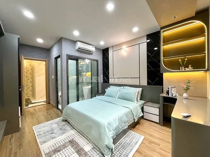 Nhà 4 x 11 đúc 1 lững 4 lầu có thang máy quang trung p11 gò vấp 