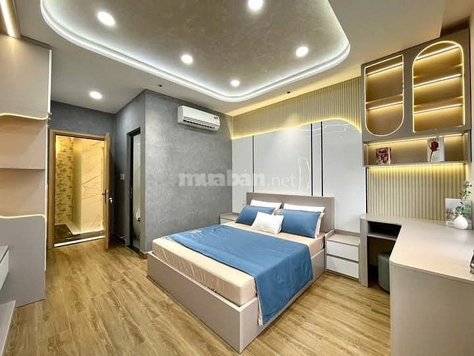 Nhà 4 x 11 đúc 1 lững 4 lầu có thang máy quang trung p11 gò vấp 