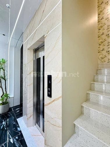 Nhà 4 x 11 đúc 1 lững 4 lầu có thang máy quang trung p11 gò vấp 