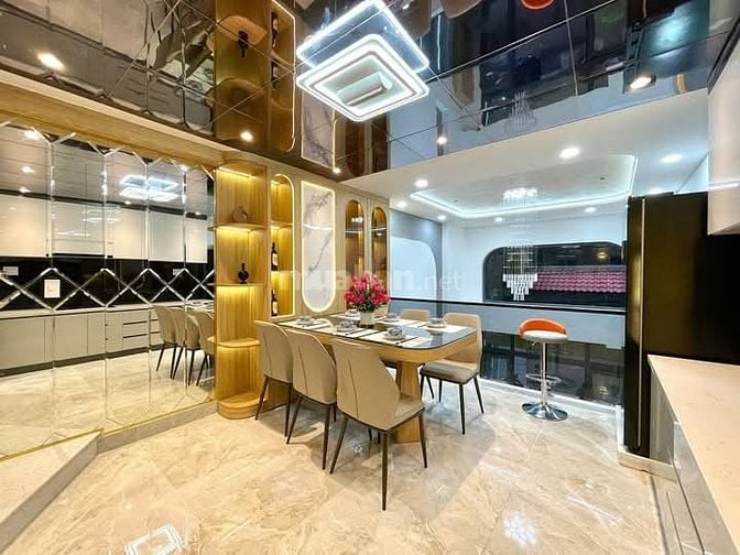 Nhà 4 x 11 đúc 1 lững 4 lầu có thang máy quang trung p11 gò vấp 