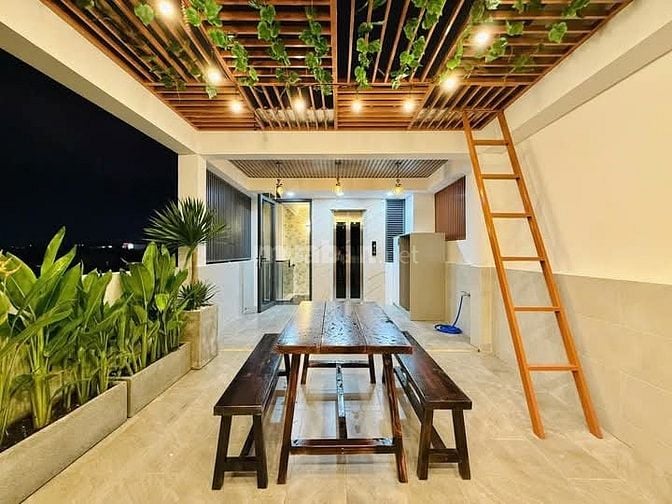 Nhà 4 x 11 đúc 1 lững 4 lầu có thang máy quang trung p11 gò vấp 