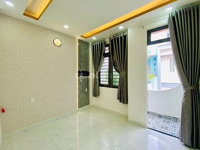 Nhà 4 lầu tuyệt đẹp CAO CẤP hẻm xe hơi 6m Quang Trung, P14, Q.Gò Vấp.