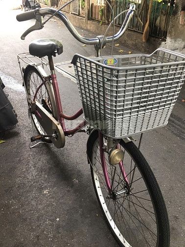 Bán xe đạp mini nữ – màu hồng tím, còn sử dụng tốt