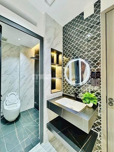 3 tỷ 550, nhà 64m² Võ Văn Tần xây 1 trệt 4 lầu. Hẻm 7m gần Vườn Chuối