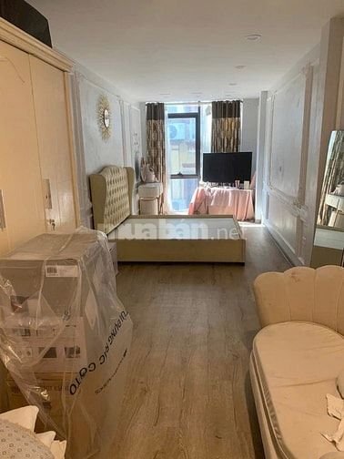 Tôi cần bán nhà Phố Phố Linh Quang, Q Đống Đa, Dt 70 m x 7 T, Mt 5,5 m