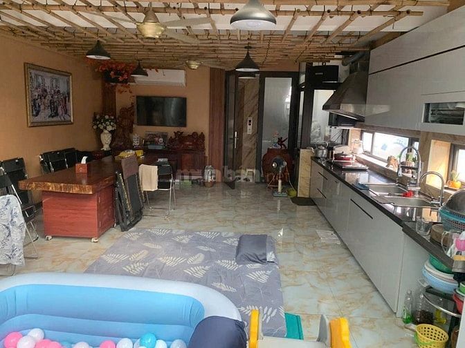 Tôi cần bán nhà Phố Phố Linh Quang, Q Đống Đa, Dt 70 m x 7 T, Mt 5,5 m