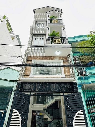 Nhà mới xây 5 tầng,Đường rộng 8m,rổ giá 6toi65o
