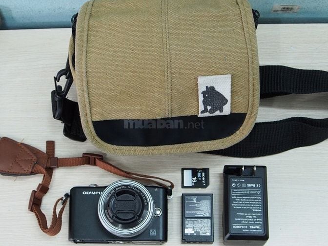 Máy ảnh OLYMPUS E-PM1 cũ, mất nắp pin, hoạt động tốt