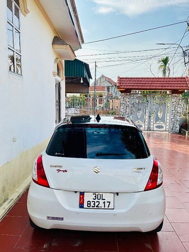Suzuki Swift SX 2015 1.4AT Bản Spenciel Logo Vàng