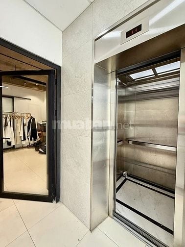 TOÀ VĂN PHÒNG " HUỲNH VĂN BÁNH" 103m2 ( 7x15m ) 5 TẦNG THUÊ 75TRIỆU