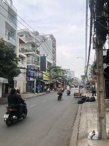 Tòa nhà mặt tiền Bùi Đình Túy 161m2, 7x25m, nở hậu 8m, 6 tầng, 36.5 ỷ
