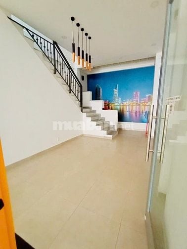 Cho thuê nhà mặt tiền Bùi Đình Túy trệt suốt nhà đã sửa mới