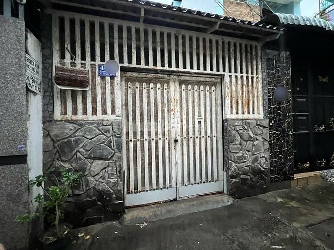Nhà hẻm 1 trục DT:4x16m Đỗ Thúc Tịnh, P12, Q.Gò Vấp.