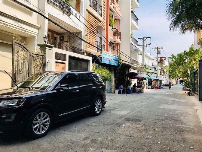 Nhà 6 tầng Góc 2 Mặt tiền Lê Văn Sỹ Phú Nhuận THANG MÁY HẺM XE HƠI 8M