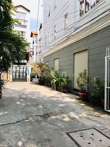 Nhà 6 tầng Góc 2 Mặt tiền Lê Văn Sỹ Phú Nhuận THANG MÁY HẺM XE HƠI 8M