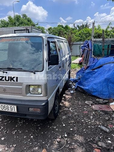 Bán tải SUZUKI CARRY van  580 kg màu trắng đời 2016  chạy giờ cầm 