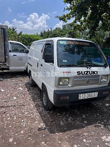 Bán tải SUZUKI CARRY van  580 kg màu trắng đời 2016  chạy giờ cầm 