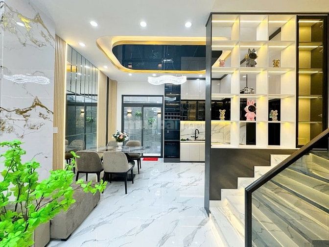HOT.  BÁN NHÀ PHỐ MỚI XÂY 5x14 - 4 TẦNG - GARA OTO - 9T2 -GIÁP Q7 1KM