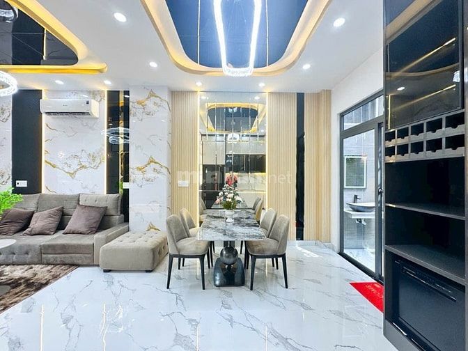 HOT.  BÁN NHÀ PHỐ MỚI XÂY 5x14 - 4 TẦNG - GARA OTO - 9T2 -GIÁP Q7 1KM
