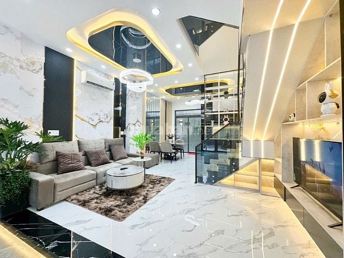 HOT.  BÁN NHÀ PHỐ MỚI XÂY 5x14 - 4 TẦNG - GARA OTO - 9T2 -GIÁP Q7 1KM