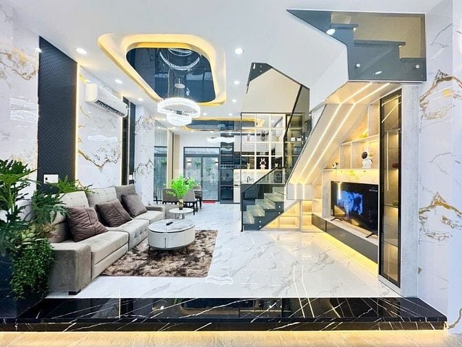 HOT.  BÁN NHÀ PHỐ MỚI XÂY 5x14 - 4 TẦNG - GARA OTO - 9T2 -GIÁP Q7 1KM