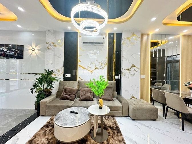 HOT.  BÁN NHÀ PHỐ MỚI XÂY 5x14 - 4 TẦNG - GARA OTO - 9T2 -GIÁP Q7 1KM