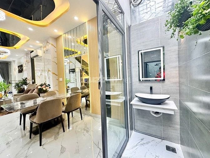 HOT.  BÁN NHÀ PHỐ MỚI XÂY 5x14 - 4 TẦNG - GARA OTO - 9T2 -GIÁP Q7 1KM