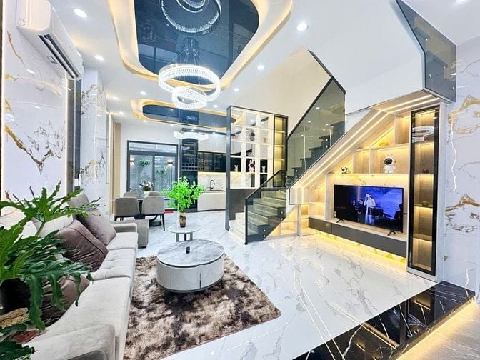 HOT.  BÁN NHÀ PHỐ MỚI XÂY 5x14 - 4 TẦNG - GARA OTO - 9T2 -GIÁP Q7 1KM