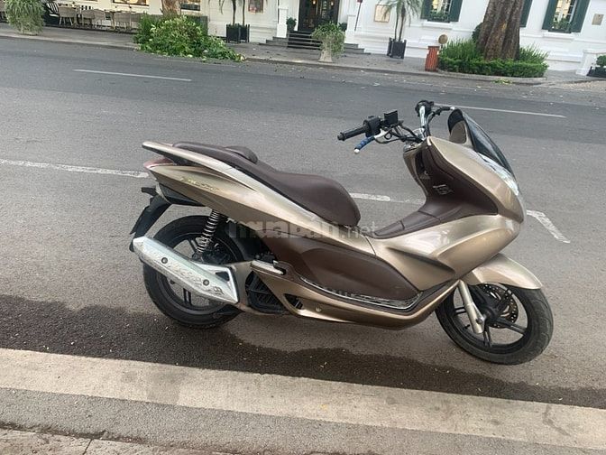 Cần bán xe Honda PCX 125cc màu vàng be, kim phun FI