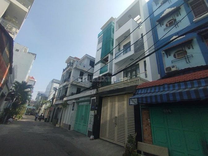 Cao ốc Phan Đăng Lưu 8 x 27m hầm 6 lầu thang máy chỉ 34.5 tỷ