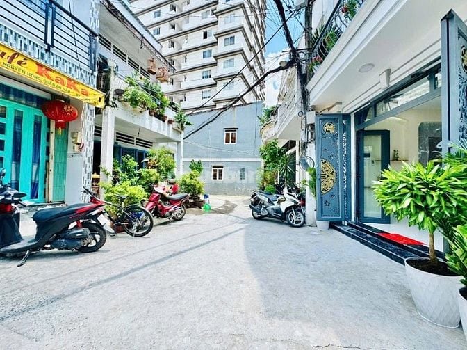 Nhà tuyệt đẹp CAO CẤP góc 2 mặt hẻm xe hơi 5m Nguyên Hồng, P1, Q.Gò Vấ